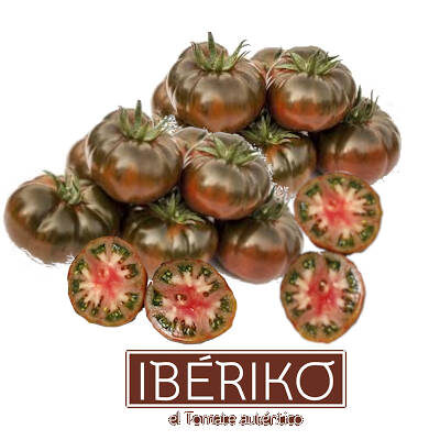 varios tomates iberikos de calidad extray varios tomates variedad ibericos cortados a la mitad